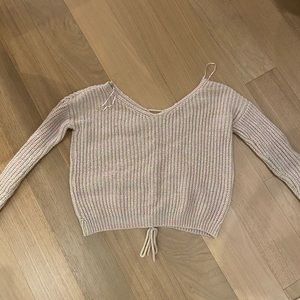 Multicolored knit sweater with lace up detail